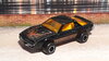 Majorette_Pontiac_Firebird_%28black%2C_trans_am%2C_yellow_interior%2C_ELO_wheels%29.jpg
