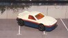 Majorette_Pontiac_Fiero_(white_&_blue,_no_tampos).jpg